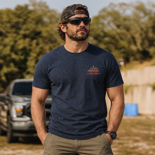 Christmas Vacation Chaos T-shirt Heather Navy front logo lifestyle creative