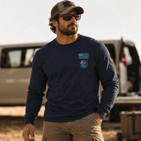 Hard To Find Christmas Bigfoot Long Sleeve Navy front logo lifestyle creative